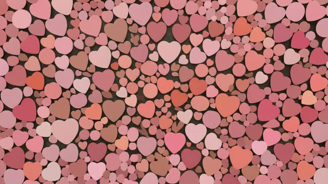 ピンク系ハートが散りばめられたパターン